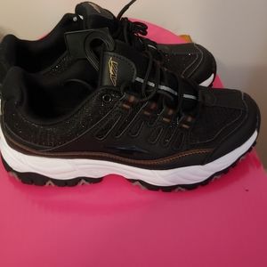 Avia black and gold sneakers